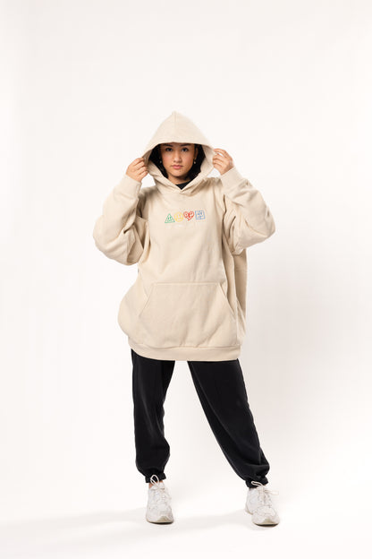 piece by piece cream and colored hoodie