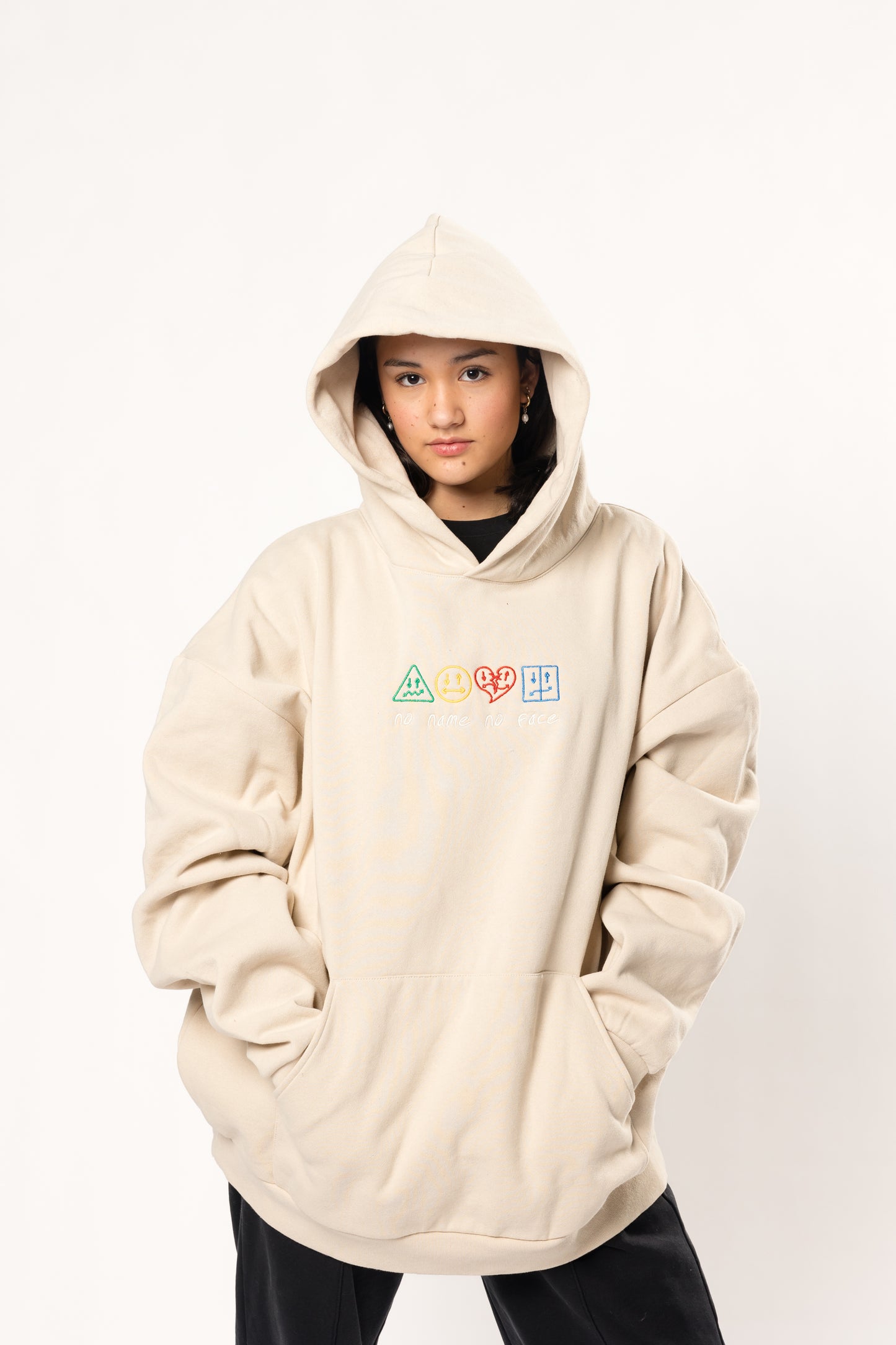 piece by piece cream and colored hoodie