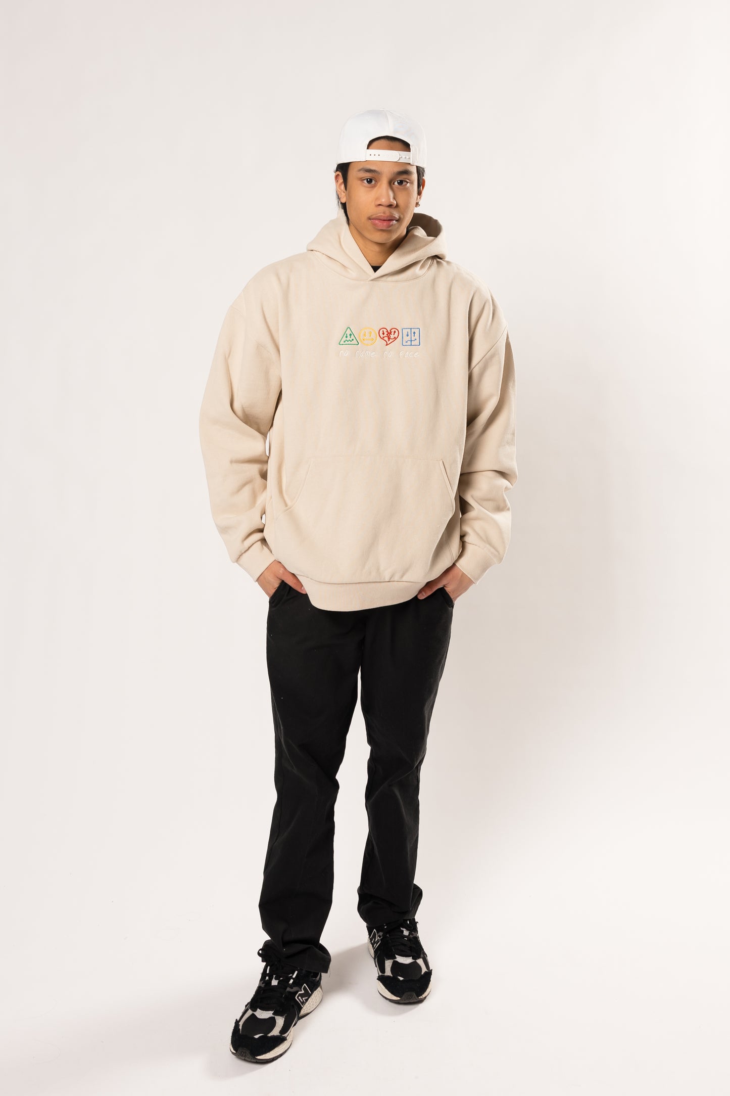 piece by piece cream and colored hoodie