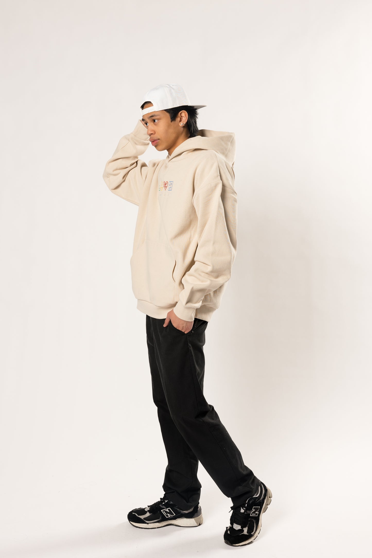 piece by piece cream and colored hoodie